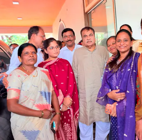 Siddhali Anup Shah with local residents at an indoor event